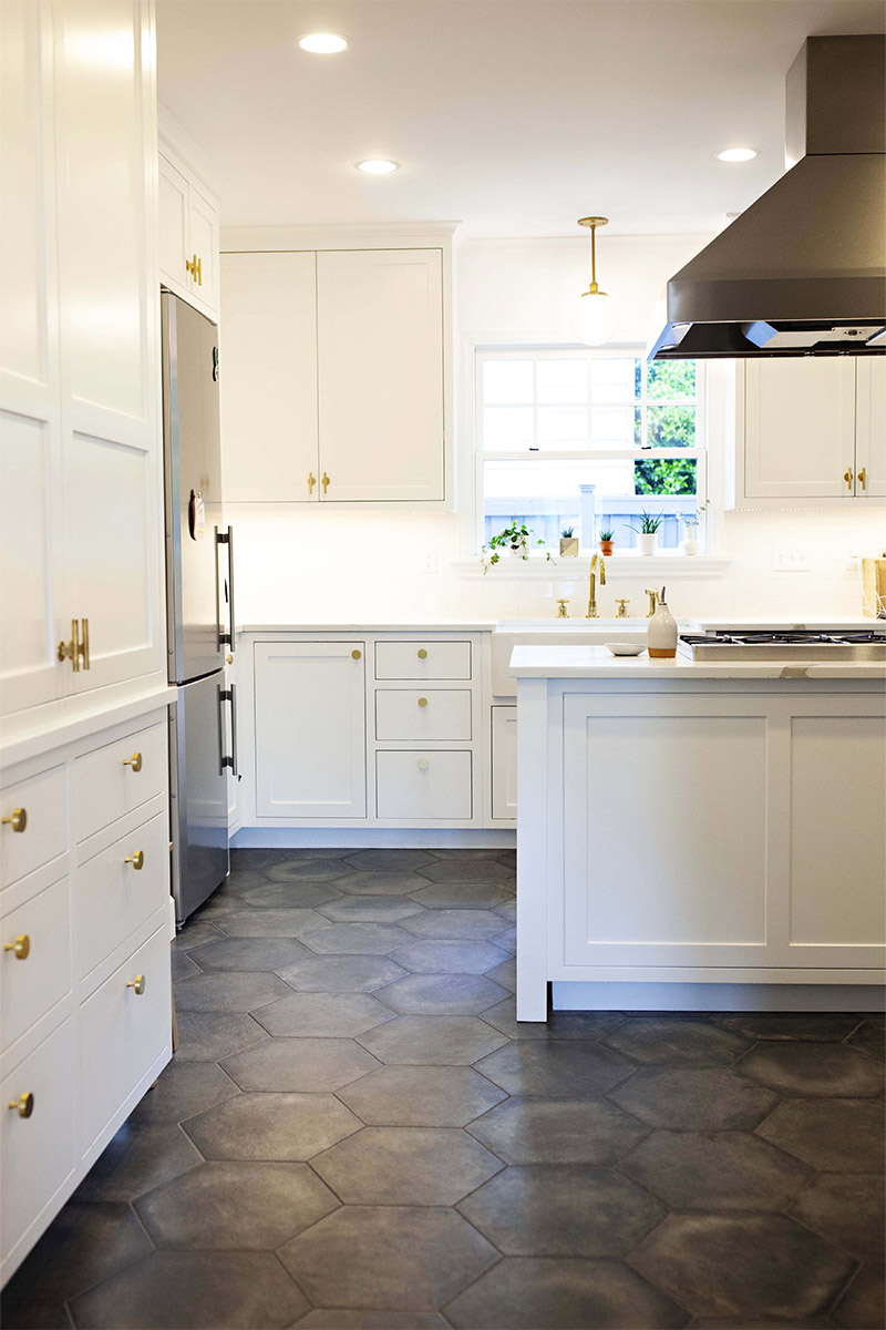 White Kitchen With Brass Hardware